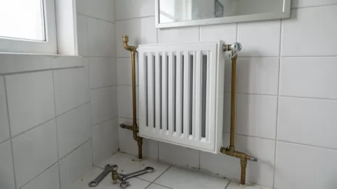 Montaż grzejnika łazienkowego w bloku